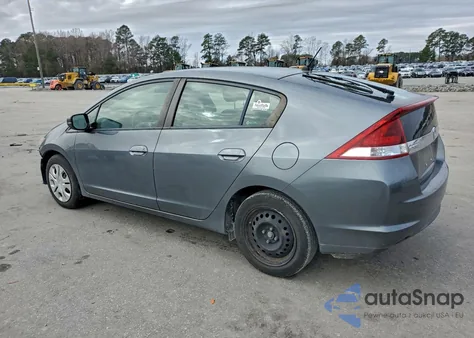 2012 Honda Insight Lx from USA, damaged, VIN JHMZE2H5XCS004259